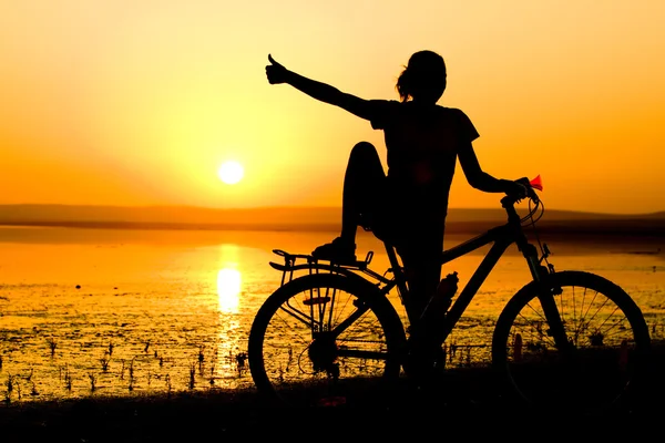 Girl with bicycle. — Stock Photo, Image