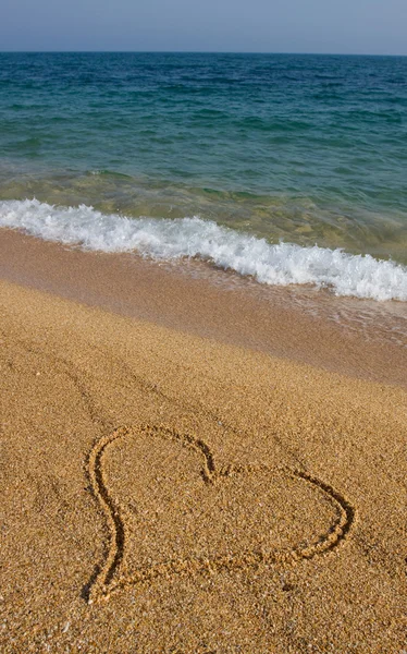 Hjärta i sanden. — Stockfoto