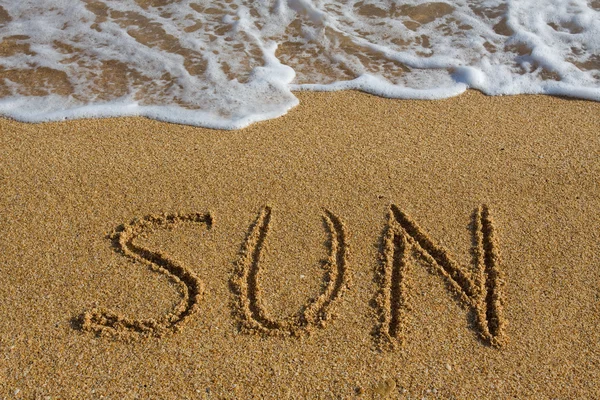 Wort Sonne am Strand. — Stockfoto