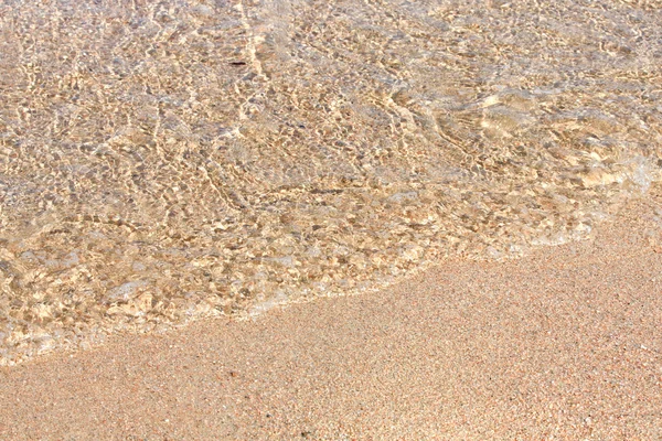 Gezouten water en zand — Stockfoto