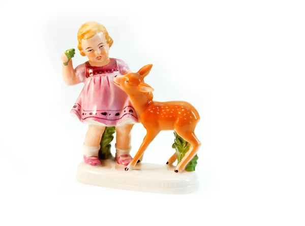 Statuette eines Mädchens mit einem Hirsch — Stockfoto