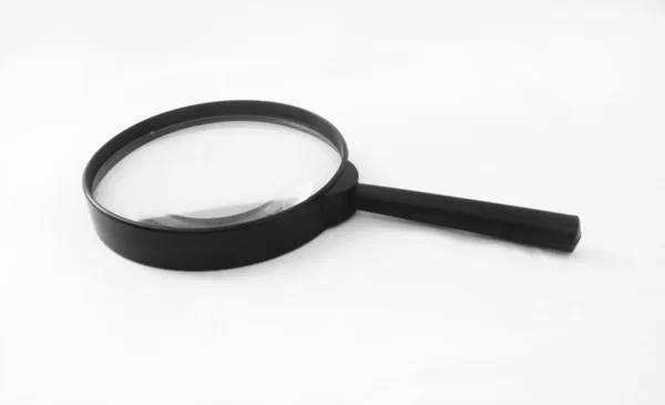 Magnifying glass on white background closeup Stock Picture