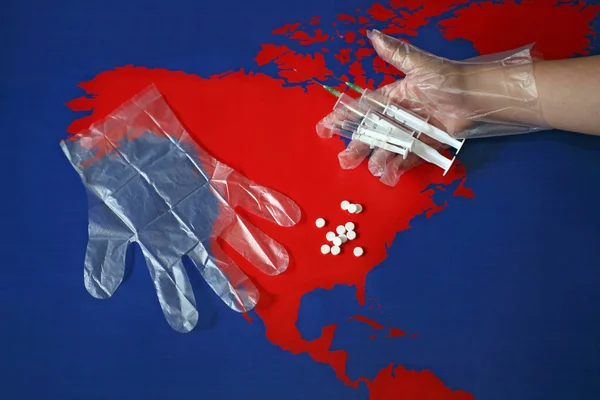 Map with tabletes, syringes and needles — Stock Photo, Image