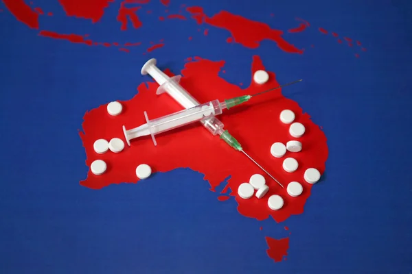 stock image Map with tabletes, syringes and needles