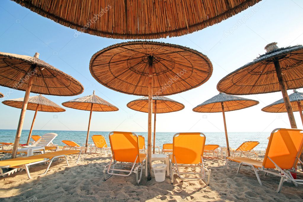 Greece, umbrellas and sunbeds