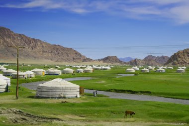 Traditional Yurts in the valley clipart