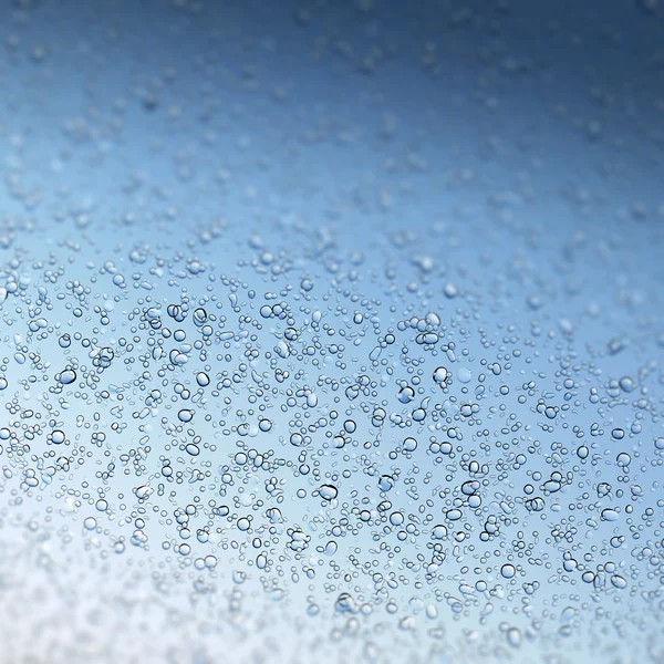 Water drops on blue, shallow DOF — Stock Photo, Image
