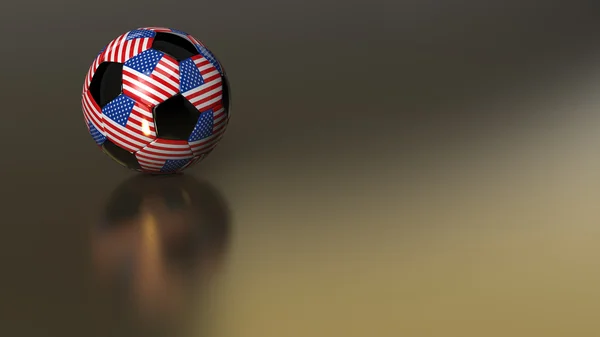 Футбольный мяч США на золотом металле — стоковое фото