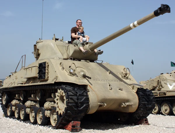 Stock image Father and son at the Museum of tanks