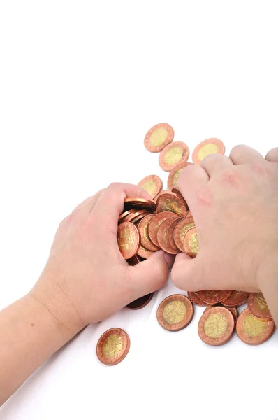 Ręką chwycić monet — Zdjęcie stockowe