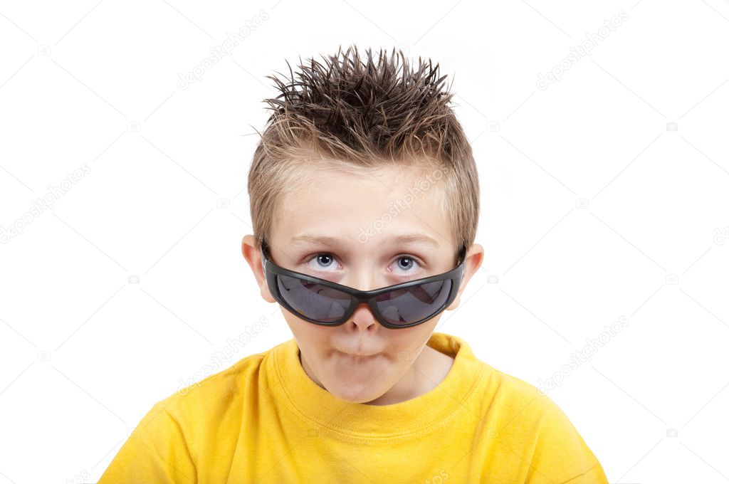 Crazy grimacing child with sunglasses, isolated on white background