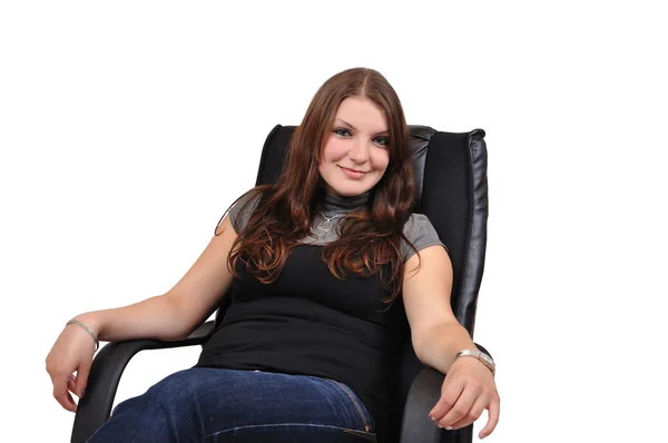 Young girl relaxing in office chair — Stock Photo, Image