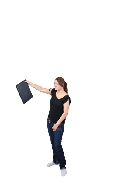 Jeune femme tenant ordinateur portable avec disgrâce Image En Vente
