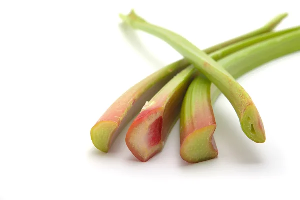 Fresh raw rhubarb on a white background — Stock Photo, Image