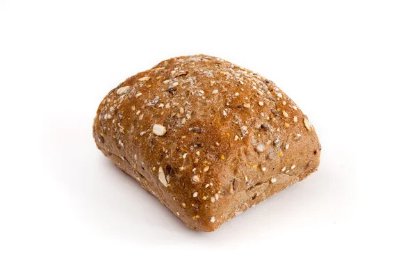 Fresh rye bread roll on cloth napkin — Stock Photo, Image