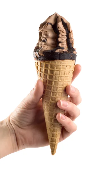 Um sorvete em uma mão é isolado — Fotografia de Stock