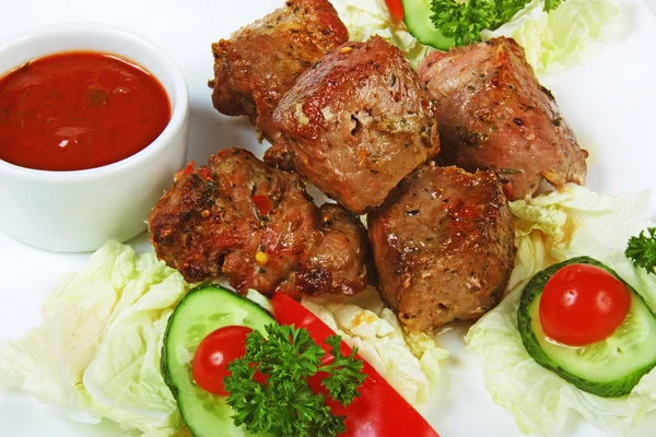Dishes of roast meat with spice — Stock Photo, Image