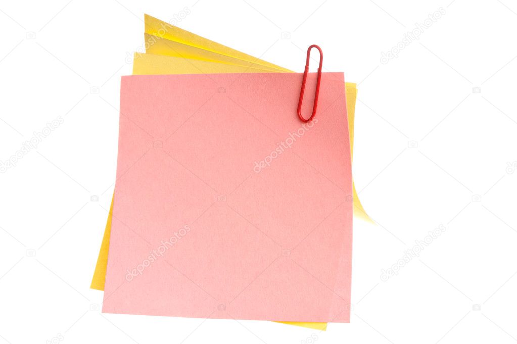 sheets of stapled paper clips isolated on a white background