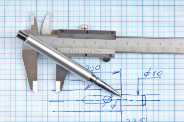 calipers, bearing and square on the background of graph paper clipart