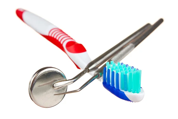 Tandenborstel en tandheelkundige instrumenten — Stockfoto