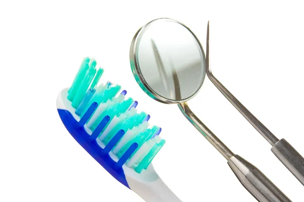 Tandenborstel en tandheelkundige instrumenten — Stockfoto
