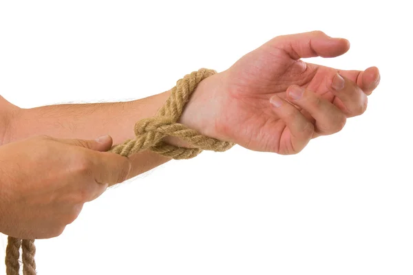 Premium Photo  Hands tying a rope on a beach