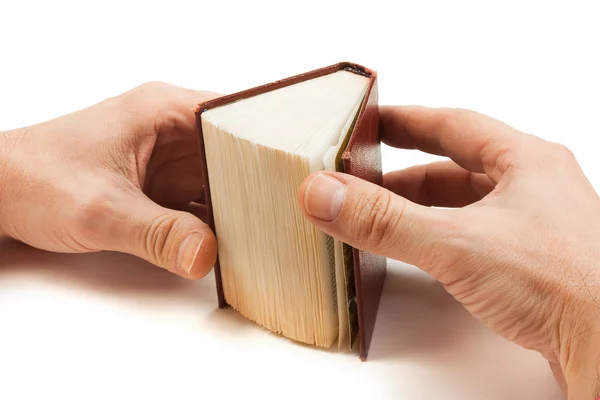 Boek in de hand — Stockfoto
