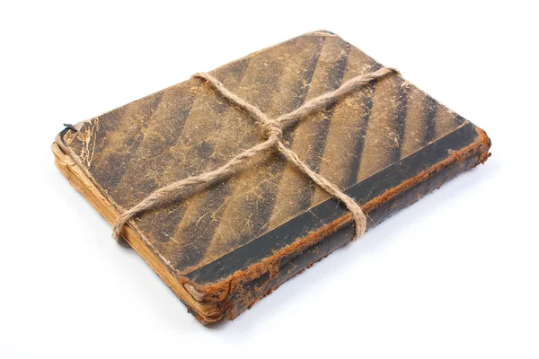 Ein altes Buch mit einem zerknitterten Laken — Stockfoto