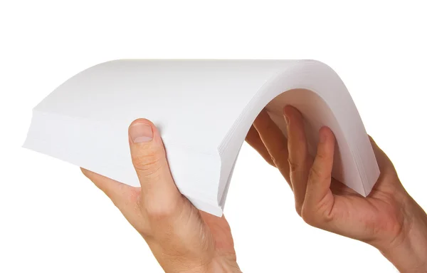 Uma pilha de papel na mão — Fotografia de Stock