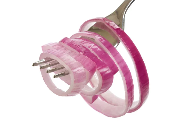 Onions on a fork — Stock Photo, Image