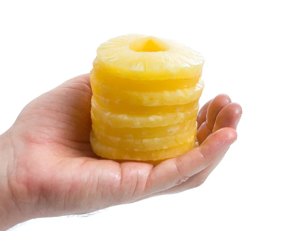 Pineapple ring in hand — Stock Photo, Image