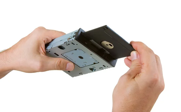Floppy disk drive in hand — Stock Photo, Image