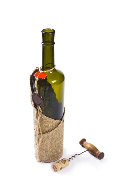 Bottle with a stopper and a corkscrew — Stock Photo, Image