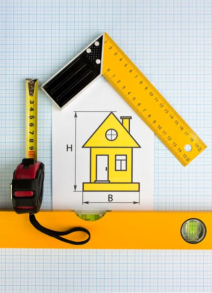 Desenho em casa com ferramentas de construção — Fotografia de Stock