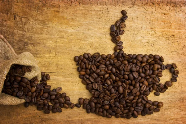 Представьте чашку кофе из бобов — стоковое фото