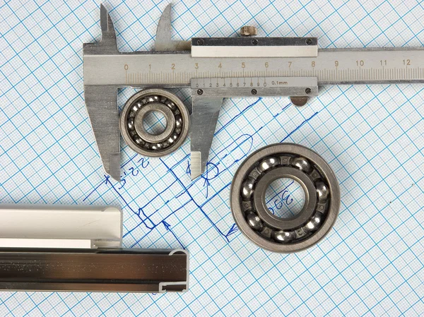 Calipers, bearing and square — Stock Photo, Image