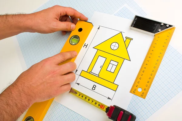 Drawing at home with construction tools — Stock Photo, Image