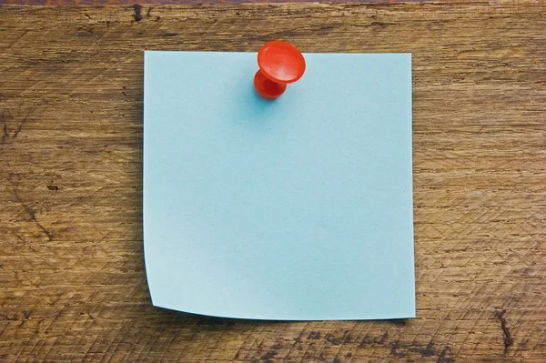 A piece of paper pinned the button — Stock Photo, Image