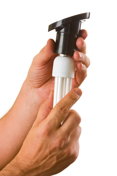 Lámpara de bajo consumo en mano — Foto de Stock