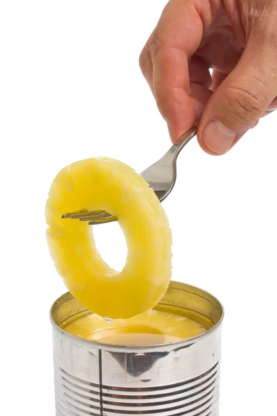 Pineapple ring on a fork — Stock Photo, Image