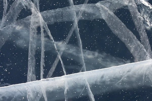 Spider web of tension cracks in ice — Stock Photo, Image