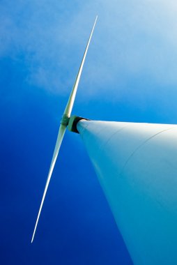 Wind turbine and blue sky clipart