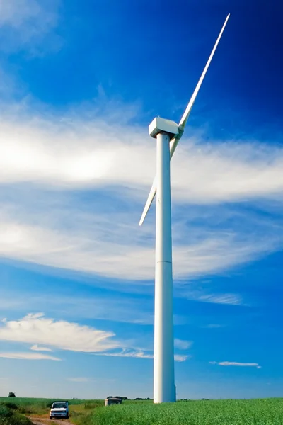 Wind turbine and small car — Stock Photo, Image