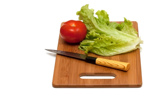 Зелений салат і помідор — стокове фото