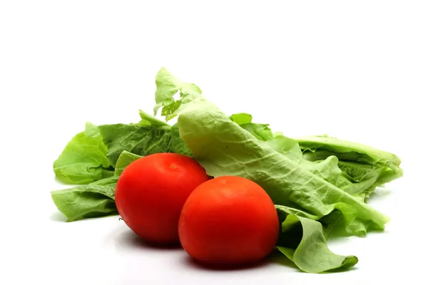 Tomater och grönsallad blad — Stockfoto
