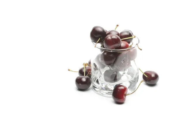 Heap of cherries in glass — Stock Photo, Image