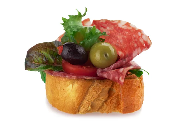 Toasted crostini topped with Salami — Stock Photo, Image
