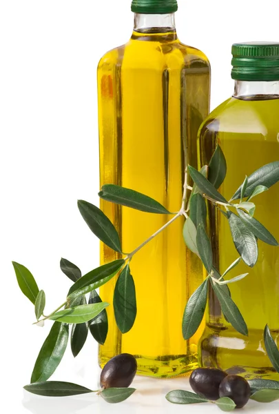 Olives and bottle with olive oil — Stock Photo, Image
