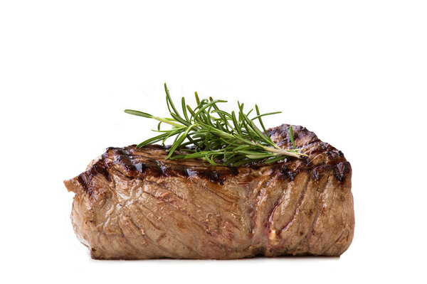 Nice juicy flamegrilled Filet Mignon isolated on white