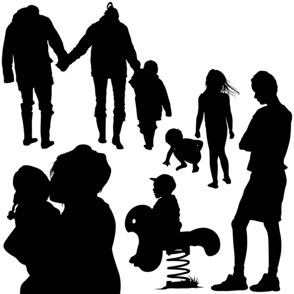 Family Silhouettes — Stock Vector